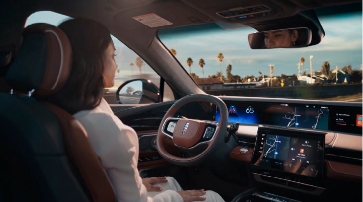 A person is shown driving hands-free on the highway with available Lincoln BlueCruise technology. | Astro Lincoln in Pensacola FL